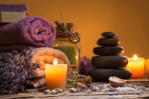 Spa still-life with stacked of stone and burning candles